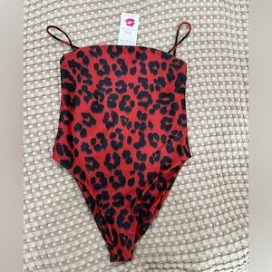 New with tags. Buddylove swim suit. Size M